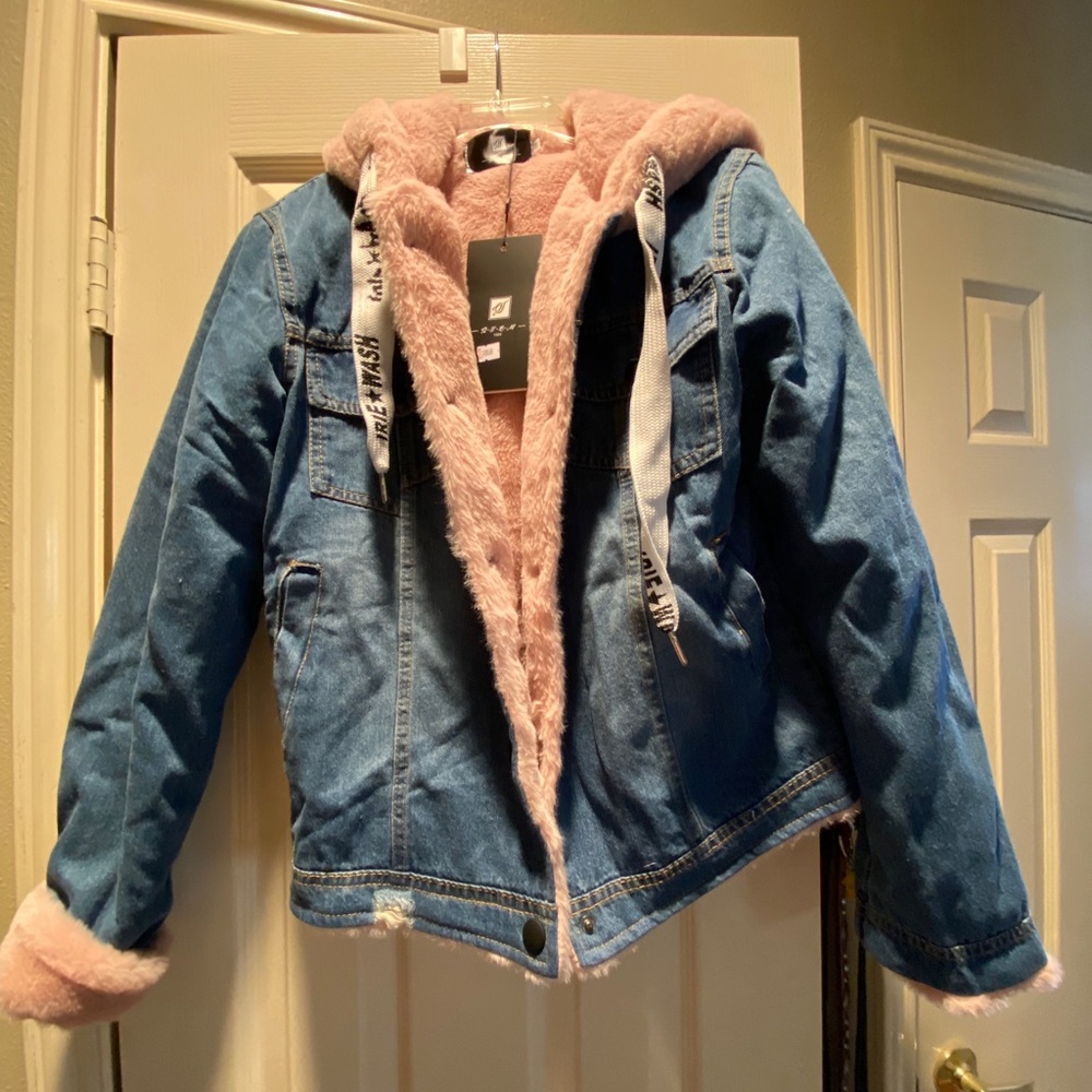 Denim jacket with faux light pink fur lining
